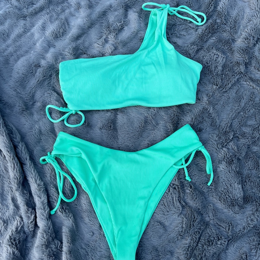 Blue swimsuit worn barely